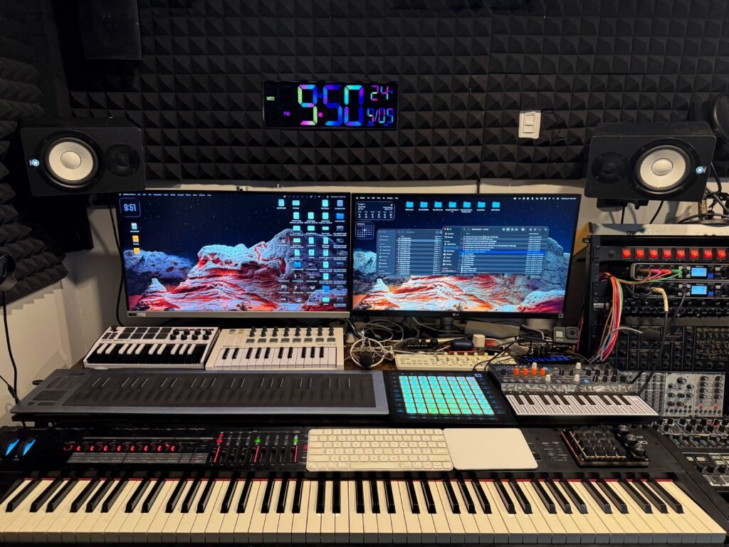Main piano performance station and audio display setup at KS Music Studio in Guelph, Ontario.